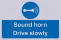 sound-horn-drive-slowly-warehousing-and-delivery-sign~
